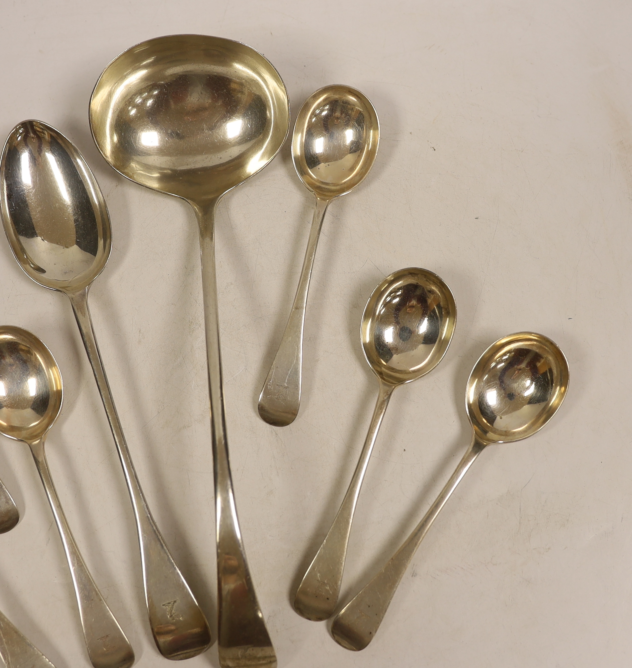 A George V silver Old English pattern soup ladle, basting spoon and set of six soup spoons, John Round & Sons, Sheffield, 1912, together with a pair of silver sifter spoons, same maker, 27.3oz.